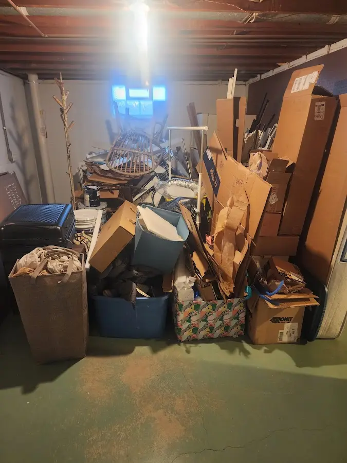 Roll-off dumpster container at job site for 2 Yard Dumpster Rental in Richardson